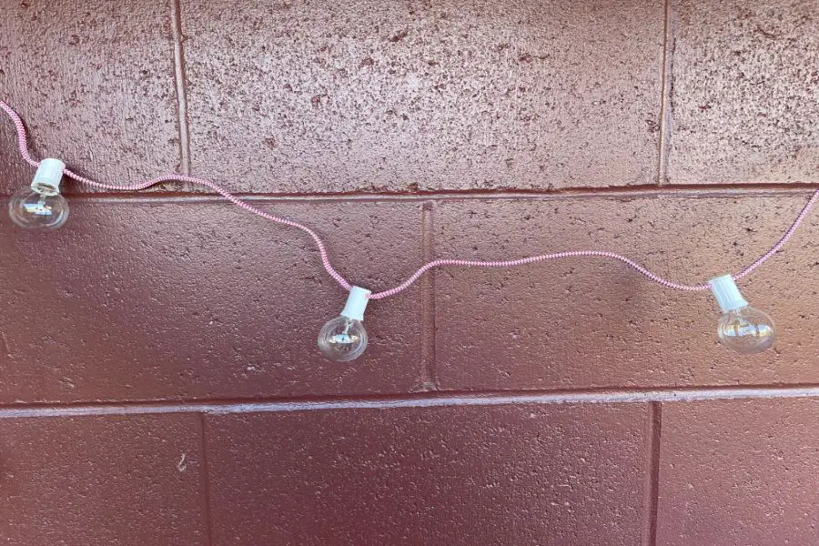 String Lights on Concrete Wall